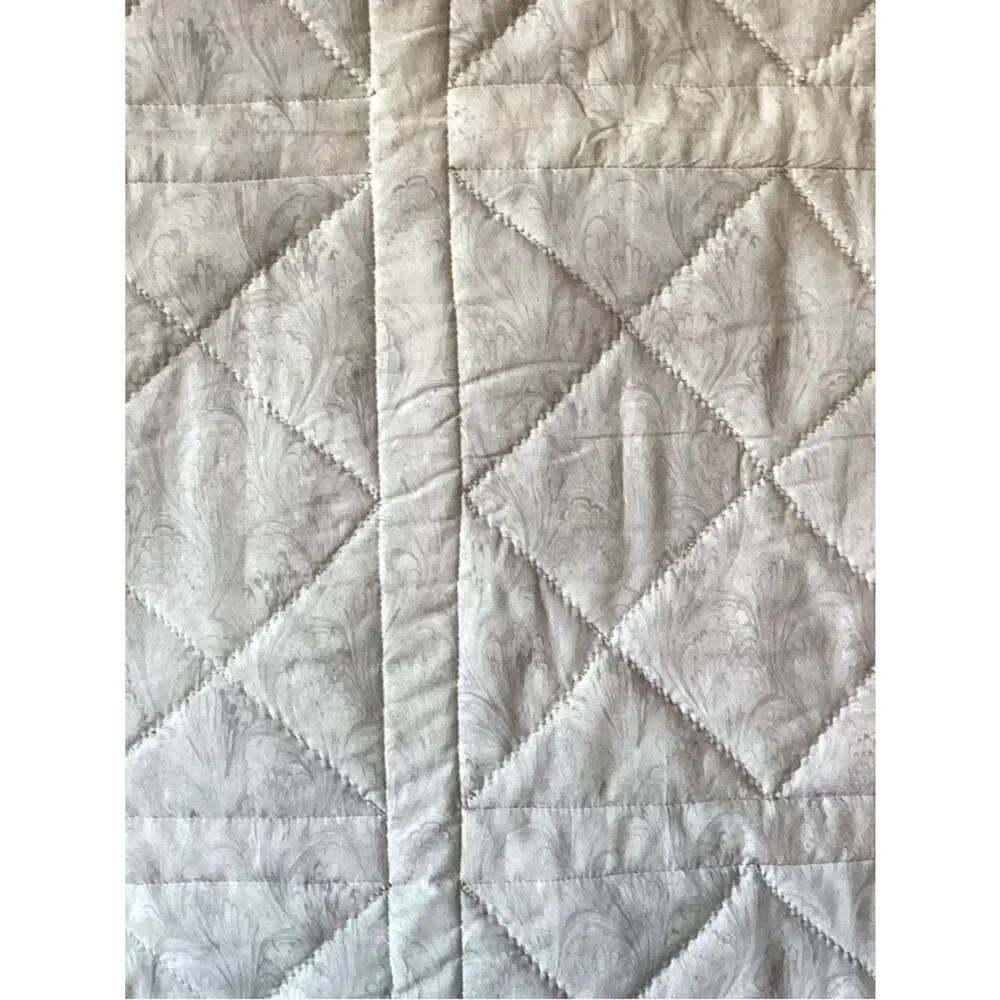 New without tags. Medley of Green Fabrics with White Borders Quilt
